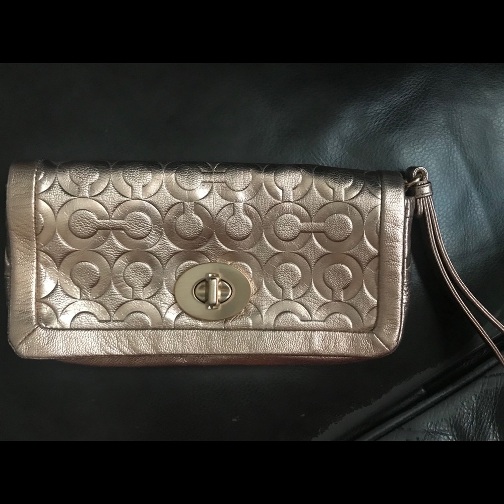 Coach Rose gold clutch/ wristlet